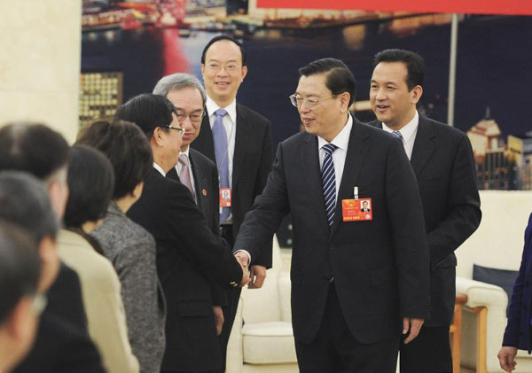 China's top leaders join discussion with deputies to 12th NPC