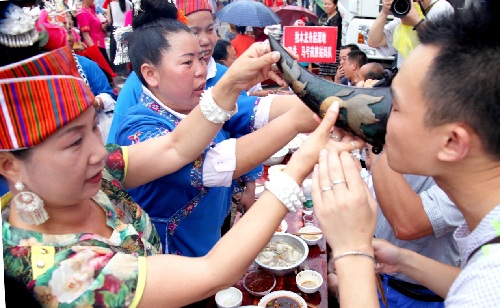 Married women return home for long table feast