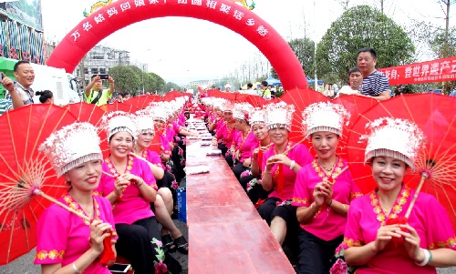 Married women return home for long table feast