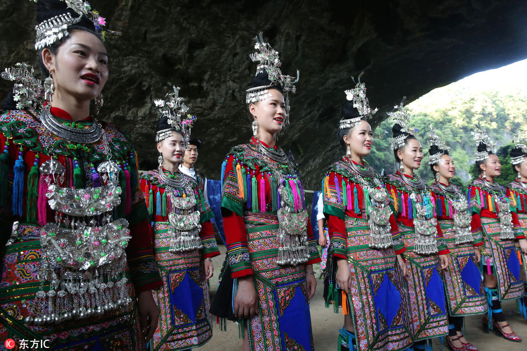 Young Dong girls perform the Grand Song