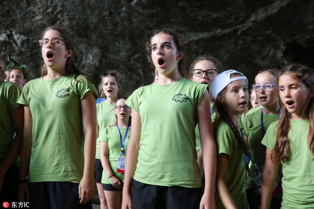 International students sing along with locals