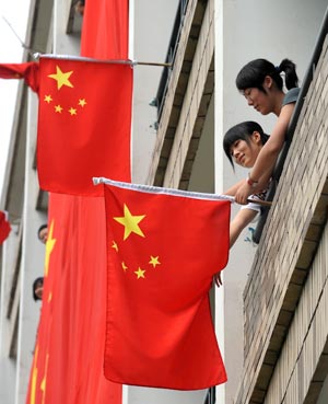 Thousands of students signs on a national flag