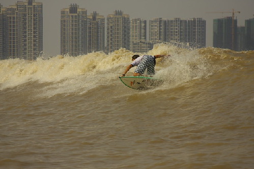 Surfing the dragon: Quest for longest wave in the world