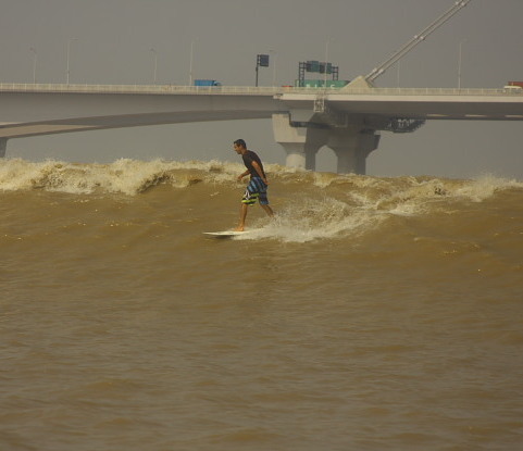 Surfing the dragon: Quest for longest wave in the world