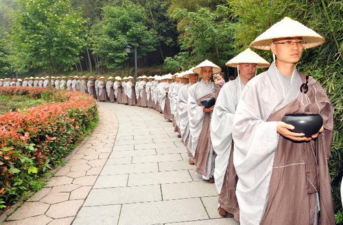 Monks hold mendicants' walk on Day of Buddha's Coming