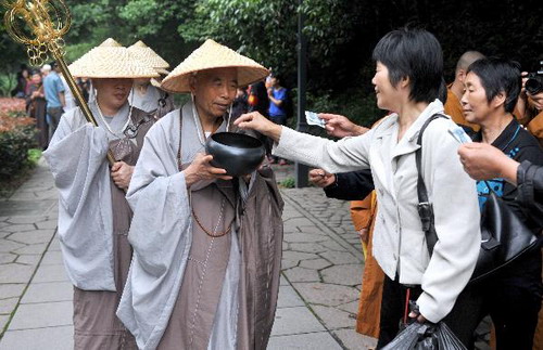 Monks hold mendicants' walk on Day of Buddha's Coming