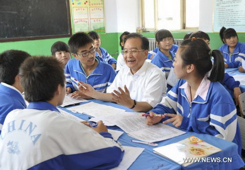 Chinese Premier calls on teachers to dedicate selves to rural education