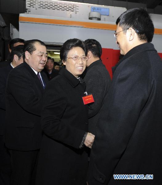 NPC deputies from C China's Henan arrive in Beijing