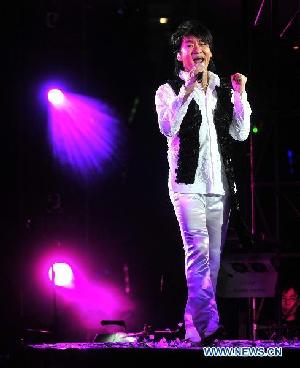 Singer Emil Chau performs at concert in Wuhan