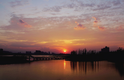 Changsha county illuminated under the glow of sunset