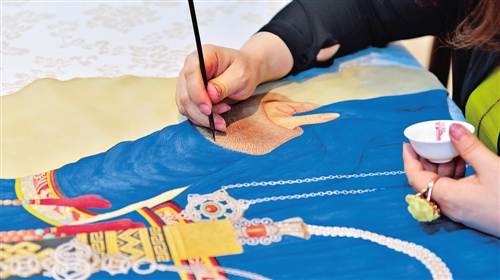 Baotou’s sheepskin painting makes debut at cultural expo