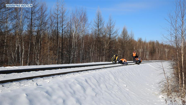 Railway workers on duty to ensure safety during holiday travel rush