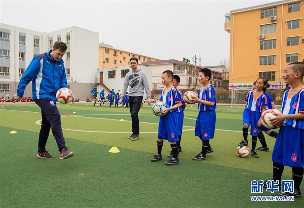 Foreign coaches teach soccer in Hohhot