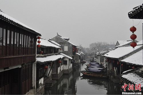 Charming Zhouzhuang covered in white snow