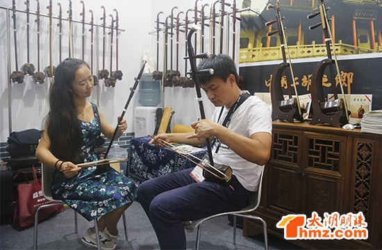 Wuxi erhu makers strike right note in Shanghai