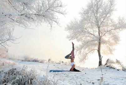 Jilin lady does yoga in chilly winter