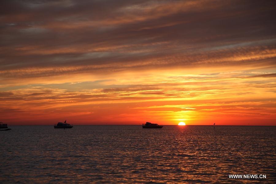 Sunglow scenery seen at Qagan Lake in Jilin