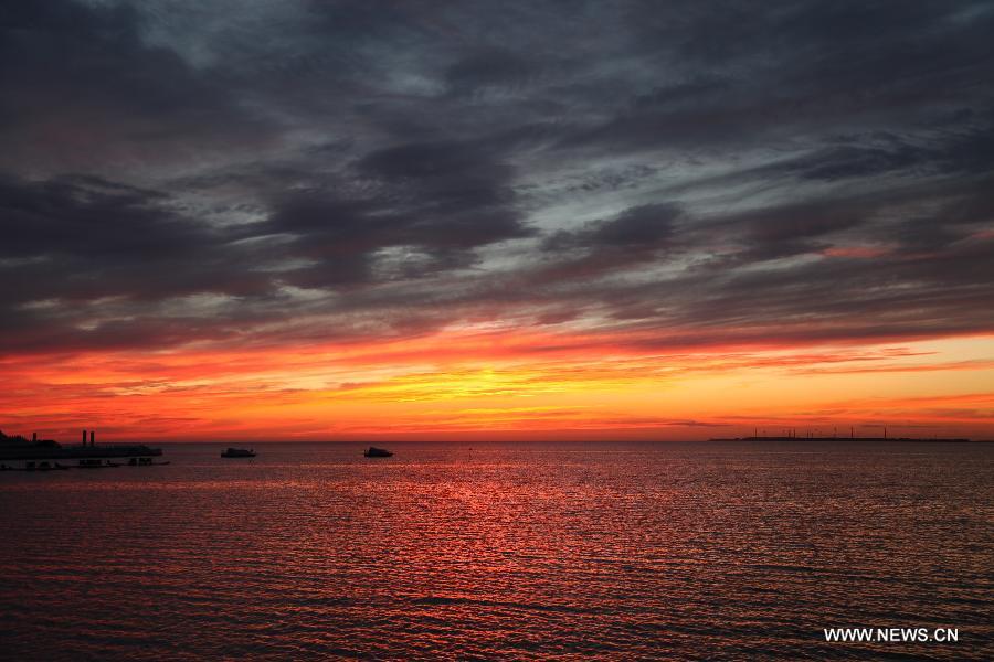 Sunglow scenery seen at Qagan Lake in Jilin