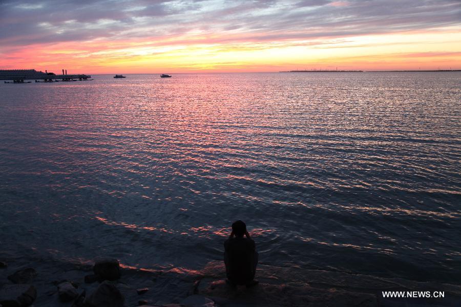 Sunglow scenery seen at Qagan Lake in Jilin