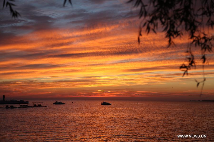 Sunglow scenery seen at Qagan Lake in Jilin