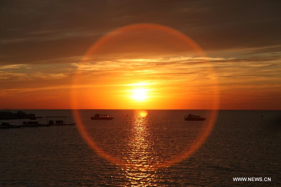 Sunglow scenery seen at Qagan Lake in Jilin