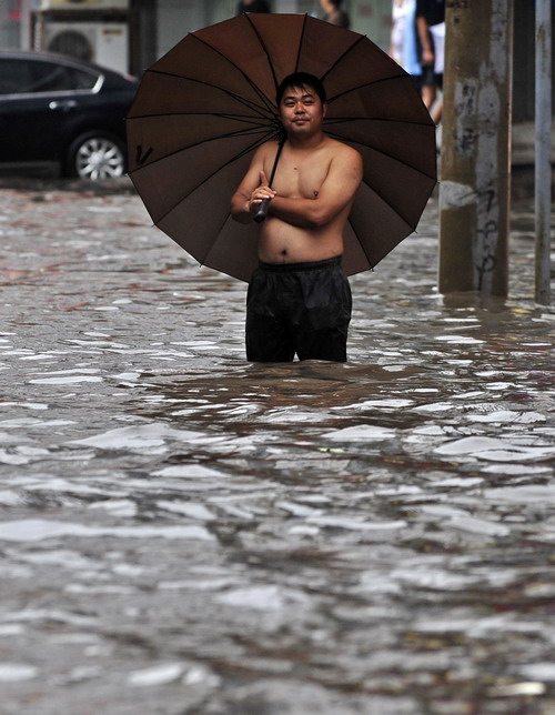 Floods overwhelm streets in NE China