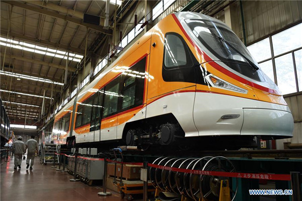 Technicians check tram designed for high-altitude region in Qingdao