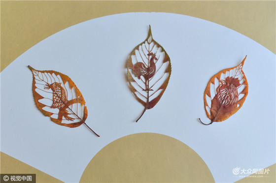 Vivid leaf carvings welcome Year of Rooster