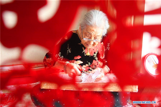 In pics: papercuttings made by 103-year-old woman