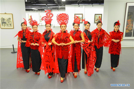 Paper cutting ornaments for qipao designed to greet Chinese Lunar New Year