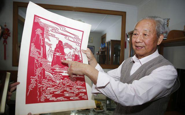Artist presents depictions of Mount Tai through paper-cutting