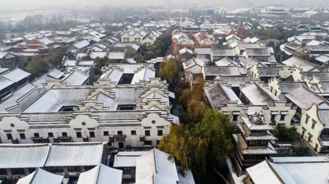 In pics: snow adorns Taierzhuang ancient town