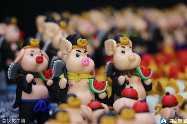 Dough figurines of pigs greet Chinese New Year in Linyi