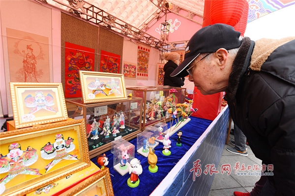 In pics: Qingdao folk fair bustles with shoppers