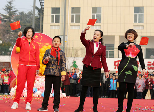 Qingdao school marks first day back
