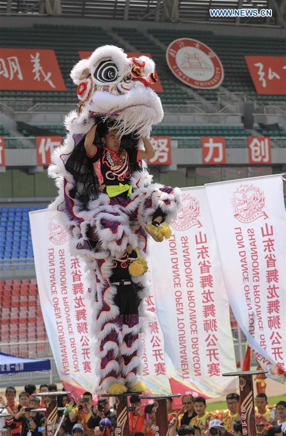 Dragon and lion dance competition held in Linyi