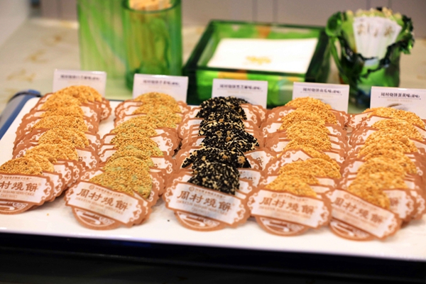 Distinct Shandong snacks highlighted at Beijing news conference