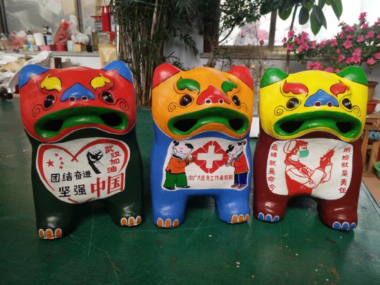 Shandong artists make clay figurines to support virus fight