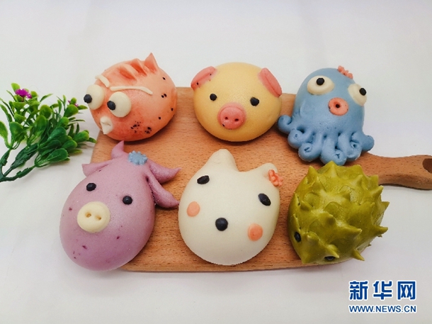 Qingdao's authentic ICH food: Laoshan dough modeling