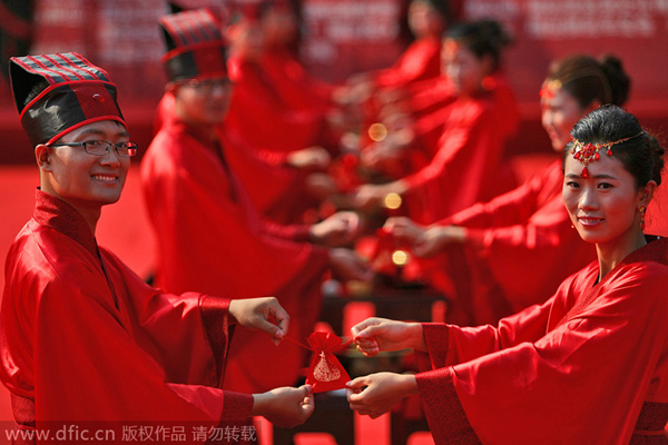 Couples tie the knot in traditional group wedding