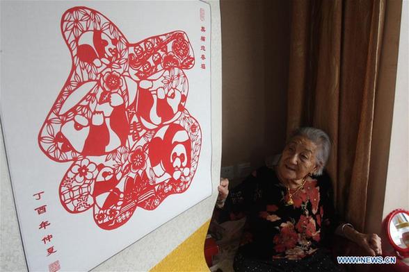 Paper-cuttings made by 103-year-old woman