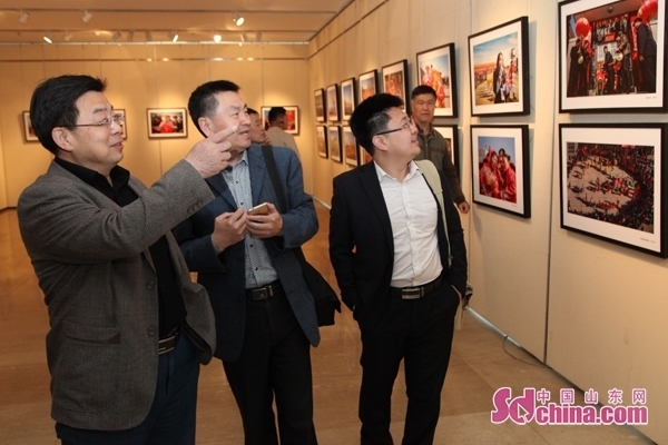 Photography exhibition showcases intangible cultural heritage in Yantai