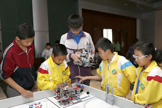 Children participate in robotic competition