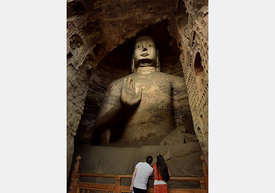 Buddha statues at grottoes across China