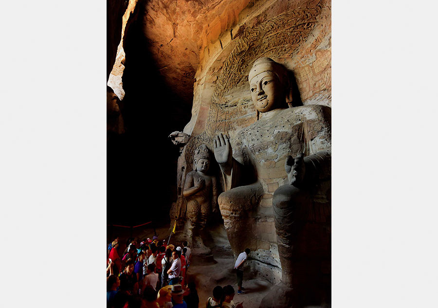 Buddha statues at grottoes across China