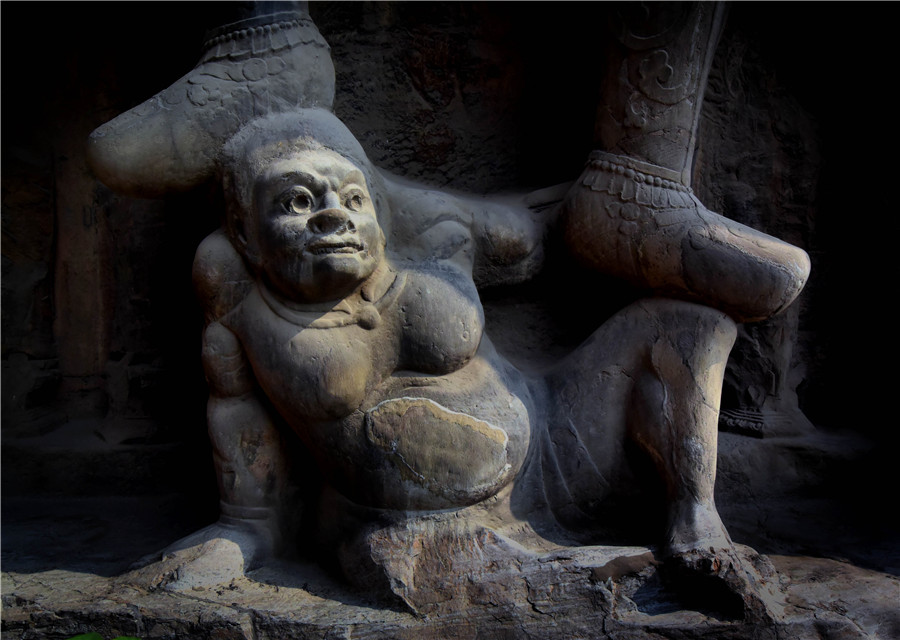 Buddha statues at grottoes across China