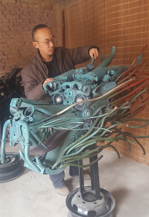 Shanxi pair turn scrap metal into art