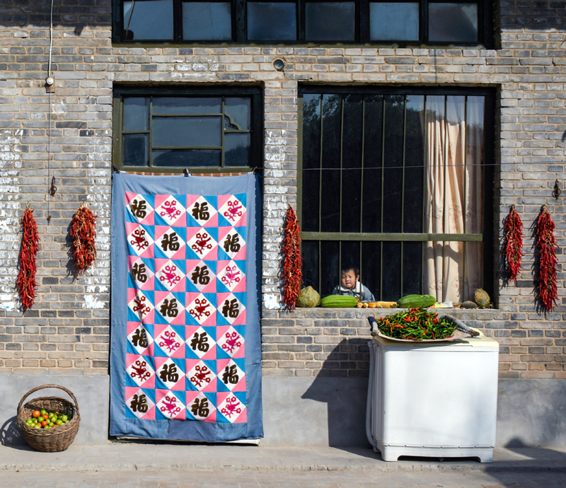 Patchwork winter door covers brighten North China homes