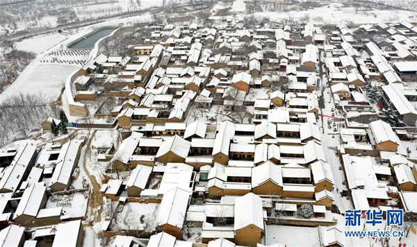 Snowfall blankets southern Shanxi