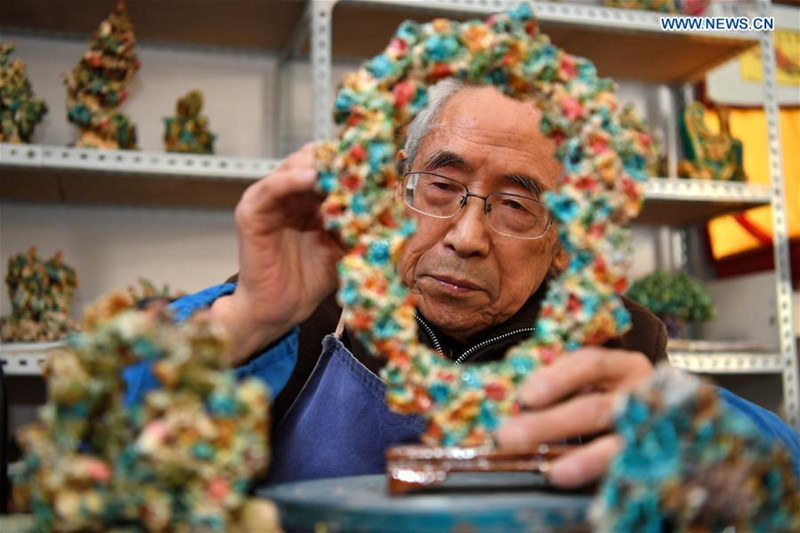 Shanxi craftsman turns waste into artwork